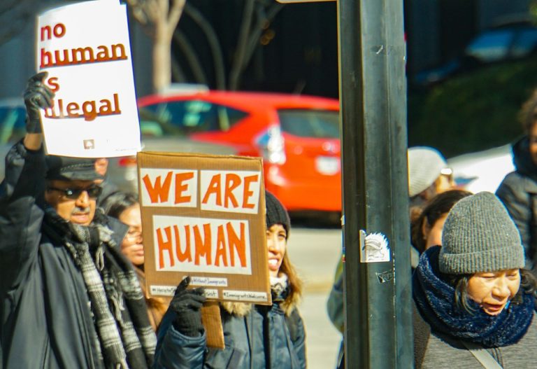 Picture of a group of immigrants marching during a protest. Photo from Wikimedia Commons.