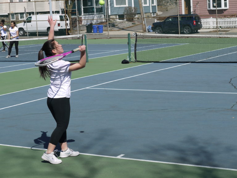 Junior Nicole Chen serving the ball. Photo taken by Jesaias Benitez.