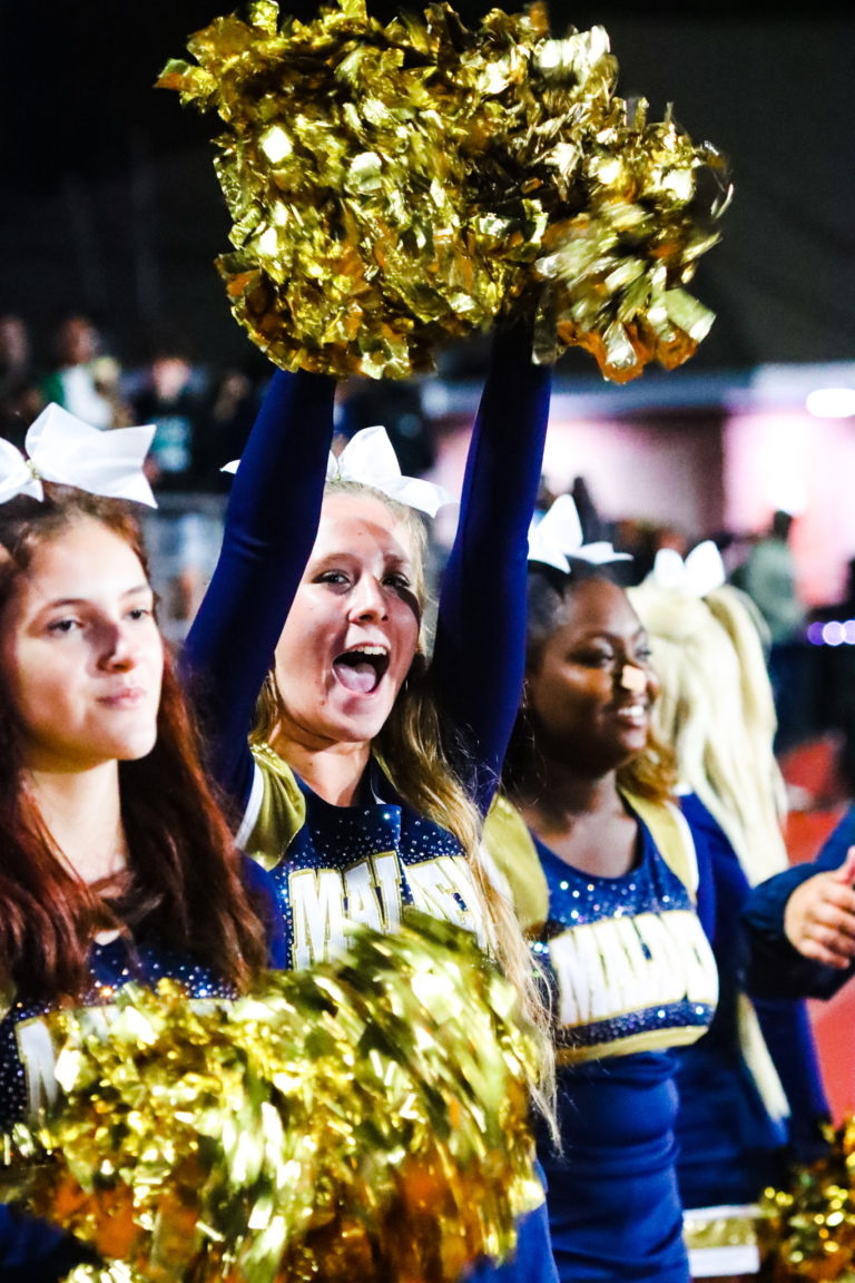 Get Your Pom Poms Ready Cheer Team Somersaults Into A New Season The Blue And Gold 