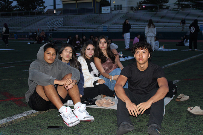 Seniors Daniel Da Silva, Johnson Huynh, Juliana Rosa De Oliveira, and Anais Perez posing for a group photo. THOMAS TIERNEY